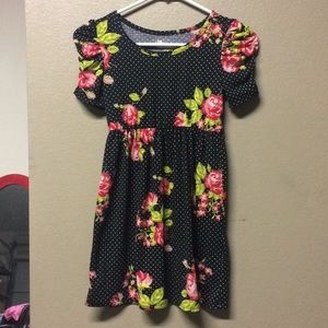 Black and polka dot, rose dress